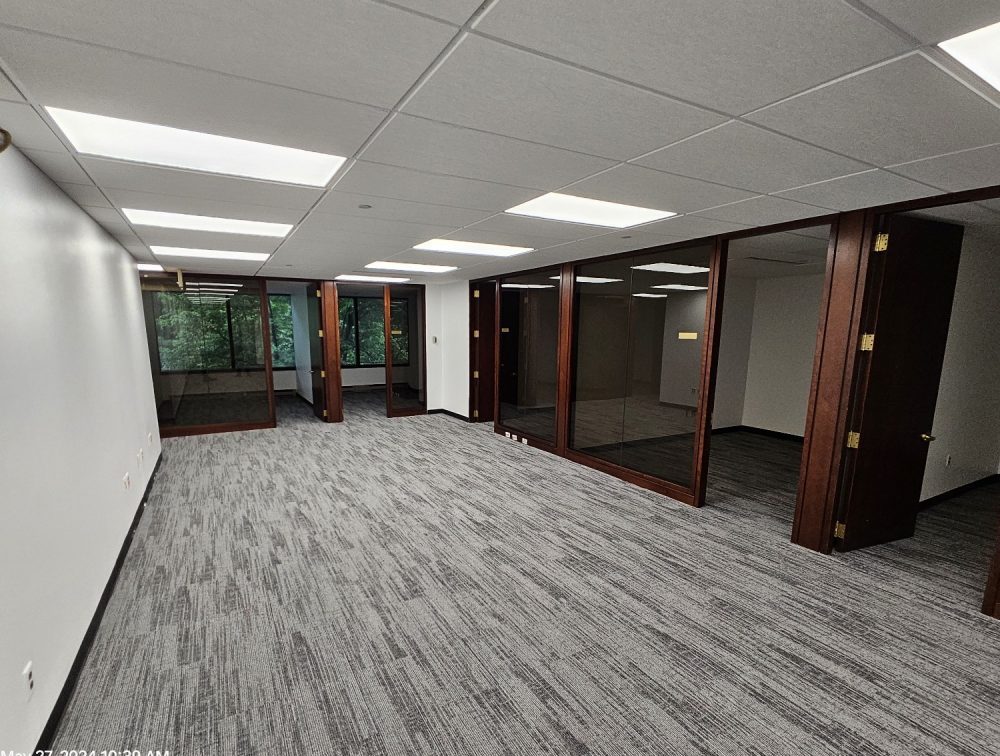 Open-plan office interior with glass partitions